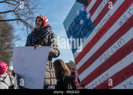 Shabina Shahnawaz, 31, from Richmond, VA. attends the large crowd in front of the Lincoln Memorial in Washington, D.C. on January 20, 2018. This is the one year anniversary of the Women's March where hundreds of thousands gathered in DC and all over the United States in support of women and to protest Donald Trump's election to President of the United States.     Photo by Ken Cedeno/UPI Stock Photo