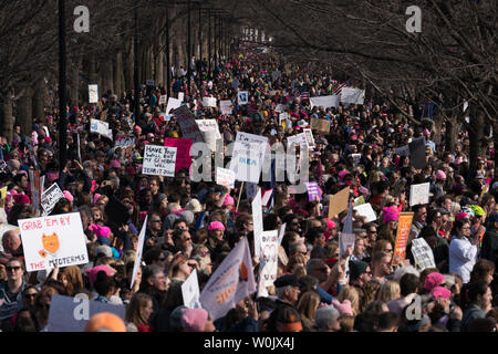 A large crowd gathered along the reflecting pool in front of the Lincoln Memorial for the Women's March in Washington, D.C. on January 20, 2018. This is the one year anniversary of the Women's March where hundreds of thousands gathered in DC and all over the United States in support of women and to protest Donald Trump's election to President of the United States.     Photo by Ken Cedeno/UPI Stock Photo