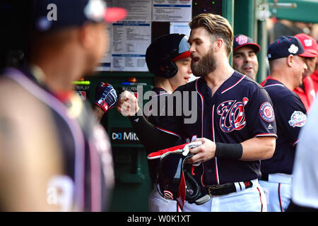 Philadelphia, Pennsylvania, USA. 6th Apr, 2019. Minnesota Twins catcher  Willians Astudillo (64) holds up the ball after tagging Philadelphia  Phillies right fielder Bryce Harper (3) out at home with relief pitcher  Adalberto