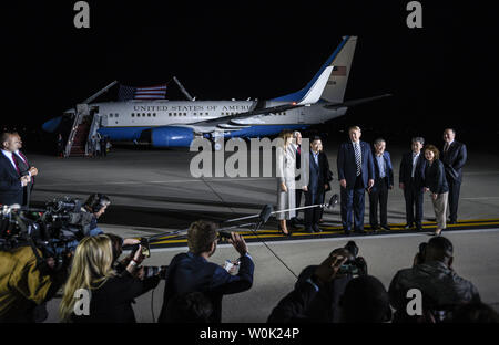 President Donald Trump greets the three American citizens Kim Hak-Song, Kim Dong-Chul, and Kim Sang-Duk, who were detained in North Korea, at Joint Base Andrews in Maryland on May 10, 2018. Photo by Leigh Vogel/UPI