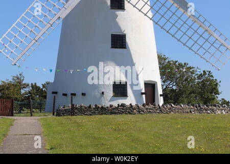 Melin Llynnon is a fully restored working windmill and café built in 1775 with iron-age roundhouses at Llanddeusant Anglesey Wales Stock Photo
