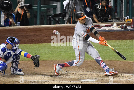 Manny Machado of the Baltimore Orioles wears Nike batting gloves