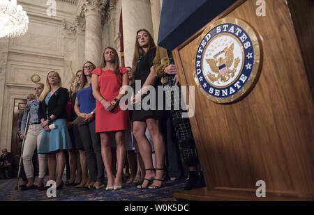 Victims of convicted child molester and former Team USA Olympic doctor Larry Nassar attend a press conference on abuse within gymnastics and youth sports and the necessary reforms needed to keep young athletes safe, on Capitol Hill in Washington, D.C. on July 24, 2018.   Photo by Kevin Dietsch/UPI