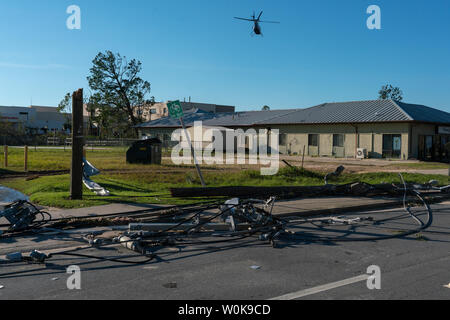 A medical helicopter takes off from a medical facility in front of downed debris following Hurricane Michael in the Florida panhandle in Panama City October 11, 2018. Michael slammed into the Florida coast October 10 as a Category 4 near Mexico Beach as the most powerful storm to hit the southern US state in more than a century. Michael made landfall around 1:00 pm Eastern time (1700 GMT), the National Hurricane Center said.    Photo by Ken Cedeno/UPI Stock Photo