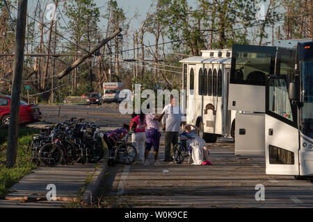 Staff help the elderly board a bus to take them from Sea Breeze Nursing home in Panama City to other nursing homes in Destin and Pensicola following Hurricane Michael in the Florida's panhandle October 11, 2018. Michael slammed into the Florida coast October 10 as a Category 4 near Mexico Beach as the most powerful storm to hit the southern US state in more than a century. Michael made landfall around 1:00 pm Eastern time (1700 GMT), the National Hurricane Center said.    Photo by Ken Cedeno/UPI Stock Photo