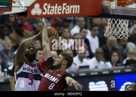 Washington Wizards forward Markieff Morris (5) shoots while guarded by Miami Heat guard Tyler Johnson (8) during the game between the Miami Heat and Washington Wizards on October 18, 2018 at Capitol One Arena in Washington, DC. Photo by Alex Edelman/UPI Stock Photo