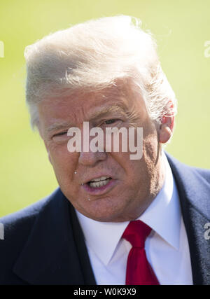 President Donald Trump speaks to reporters as he departs the White House for a rally in Houston, in Washington, D.C. on October 22, 2018. Photo by Kevin Dietsch/UPI Stock Photo