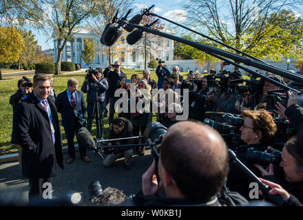 CNN reporter Jim Acosta (L) enters the White House grounds after having his White House press pass reactivated following an decision requiring the White House to immediately return Acosta's press pass by U.S. District Judge Timothy Kelly on November 16, 2018 in Washington, D.C.  CNN's Acosta's press pass was revoked following a recent President Donald Trump press conference.  Photo by Kevin Dietsch/UPI Stock Photo