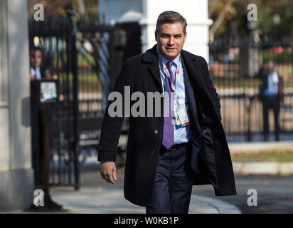 CNN reporter Jim Acosta (L) enters the White House grounds after having his White House press pass reactivated following an decision requiring the White House to immediately return Acosta's press pass by U.S. District Judge Timothy Kelly on November 16, 2018 in Washington, D.C.  CNN's Acosta's press pass was revoked following a recent President Donald Trump press conference.  Photo by Kevin Dietsch/UPI Stock Photo