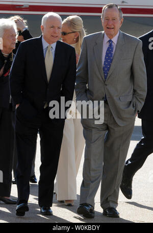 In this file photo, former President George H.W. Bush, right, and Republican presidential candidate John McCain talk on the tarmac at Hobby Airport February 18, 2008 in Houston, Texas.  George Herbert Walker Bush died November 30, 2018 at the age of 94 years.   (UPI Photo/Ian Halperin) Stock Photo