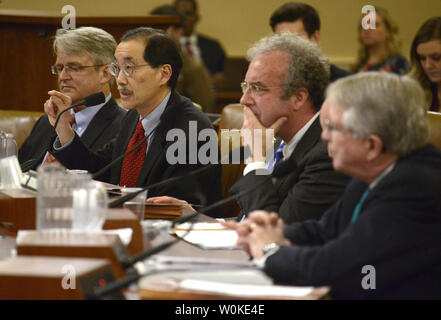 Prof. George Lin, University of Virginia testifies as (L-R) Joseph Thorndike, director of the Tax History Project, Steven Rosenthal, senior fellow at Urban-Brookings Tax Policy Center and Ken Kies, managing director of Federal Policy Group, listen during a House Ways and Means Committee hearing, on Capitol Hill, February 7, 2019, in Washington, DC. The committee was hearing testimony on proposals and tax legislation related to the president and vice president.      Photo by Mike Theiler/UPI Stock Photo