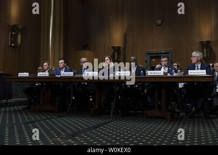 Left to Right: Richard Gonzalez, chairman and CEO of AbbVie Inc., Pascal Soriot, executive director and CEO of AstraZeneca, Giovanni Caforio, chairman of the board and CEO of Bristol-Myers Squibb Co., Jennifer Taubert, executive vice president and worldwide chairman of Janssen Pharmaceuticals, Johnson & Johnson, Kenneth Frazier, chairman and CEO of Merck & Co. Inc., Albert Bourla, CEO of Pfizer, and Olivier Brandicourt, CEO of Sanofi testify during a Senate Finance Committee hearing on Drug Pricing in America on Capitol Hill in Washington, D.C. on February 26, 2019. Photo by Alex Edelman/UPI Stock Photo