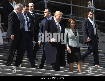 President Donald Trump (2nd,R) chats with House Speaker Nancy Pelosi as they are joined by (L-R) Rep. Richard Neal of Massachusetts, Envoy to US John Deasy, Vice President Mike Pence and Ireland's Prime Minister Leo Varadkar, as they depart Capitol Hill, March 14, 2019, in Washington, DC. The officials were attending a traditional St. Patrick's Day luncheon.     Photo by Mike Theiler/UPI Stock Photo