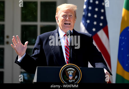 President Donald Trump speaks at a joint press conference with Brazilian President Jair Bolsonaro in the Rose Garden at the White House in Washington, DC on March 19, 2019.          Photo by Pat Benic/UPI Stock Photo
