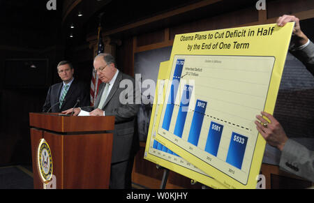 Sen. Kent Conrad, D-ND, (L) and Rep. John Spratt, D-SC, react to the fiscal year 2010 budget proposed by U.S. President Barack Obama on Capitol Hill in Washington on February 26, 2009.  (UPI Photo/Roger L. Wollenberg) Stock Photo