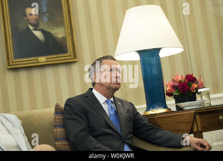 John Kasich, Governor of Ohio, attends a meeting with President Barack Obama and other business, government, and national security leaders to discuss the Trans-Pacific Partnership, in the Oval Office at the White House in Washington, D.C. on September 16, 2016. Photo by Kevin Dietsch/UPI Stock Photo