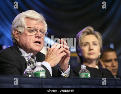 Sen. Edward Kennedy, D-Mass. (L) speaks as he attends with Senators Hillary Rodham Clinton (D-NY) and Barack Obama (D-Ill) (R) at the NAACP 'Voting Our Values, Valuing Our Votes' convention at the Washington Convention Center in Washington on July 19, 2006. (UPI Photo/Yuri Gripas) Stock Photo