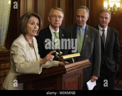 U.S. House Speaker Nancy Pelosi (D-CA) speaks during a joint news conference with Senate Majority Leader Harry Reid (D-NV) and Senator Charles Schumer (D-NY) about the progress made in President Obama's first 100 days in office on Capitol Hill in Washington on April 29, 2009. (UPI Photo/Yuri Gripas) Stock Photo