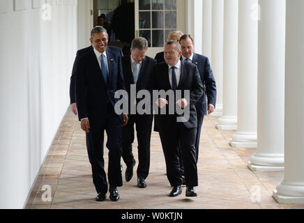 President Barack Obama (L) smiles as he talks with Denmark Prime Minister Lars Lokke Rasmussen as they and other Nordic leaders walk along the White House Colonnade to the Oval Office during the State Visit in Washington, D.C. on May 13, 2016.  Other Nordic leaders are second row Finland President Sauli Niinisto and Sweden Prime Minister Stefan Lofven (R), third row Iceland Prime Minister Sigurdur Ingi Johannsson and Norway Prime Minister Erna Solberg (R).     Photo by Pat Benic/UPI Stock Photo