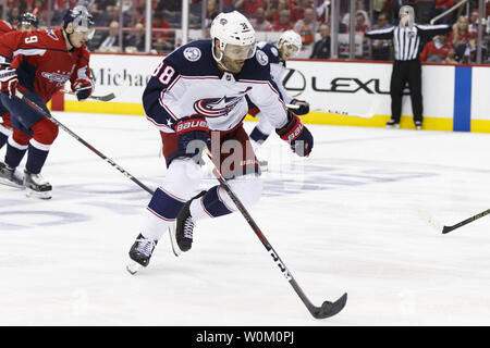 Washington Capitals center Boone Jenner (22) and Buffalo Sabres ...