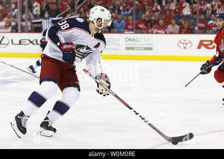 Washington Capitals center Boone Jenner (22) and Buffalo Sabres ...