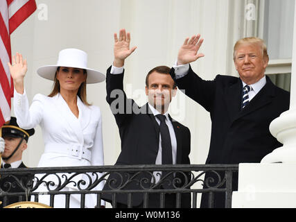 U.S. President Donald Trump, first lady Melania Trump, French President Emmanuel Macron and Brigitte Macron wave from the balcony during official welcoming ceremony for the French State Visit at the White House on Tuesday, April 24, 2018.   Photo by Pat Benic/UPI
