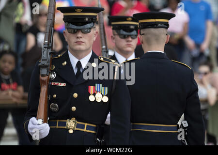 The changing of the guard by the Tomb Guard sentinels of the 3rd U.S. Infantry Regiment takes place at the Tomb of the Unknown Soldiers at Arlington National Cemetery in Arlington, Virginia on Mary 23, 2019. The Tomb is guarded 24 hours a day.  More than 250,000 flags were placed on the tombstones of the fallen during Flags-In day prior to Memorial Day.   Photo by Pat Benic/UPI Stock Photo