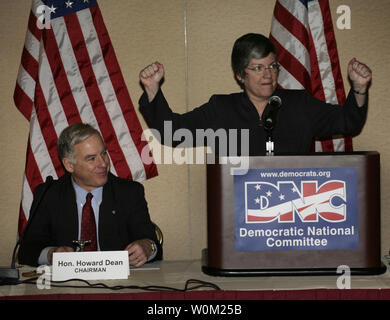 Democratic National Committee (DNC) Chairman Howard Dean (L) smiles as Gov. Janet Napolitano (D-AZ) delivers remarks at the DNC Executive Committee meeting in Washington on February 2, 2007. (UPI Photo/Yuri Gripas) Stock Photo