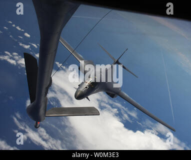 Two U.S. Air Force B-1B Lancers assigned to the 9th Expeditionary Bomb Squadron, deployed from Dyess Air Force Base, Texas, fly a 10-hour mission from Andersen Air Force Base, Guam, through the South China Sea, operating with the U.S. Navy's Arleigh Burke-class guided-missile destroyer USS Sterett (DDG 104), on June 8, 2017. Photo by Tech. Sgt. Richard P. Ebensberger/U.S. Air Force/UPI Stock Photo