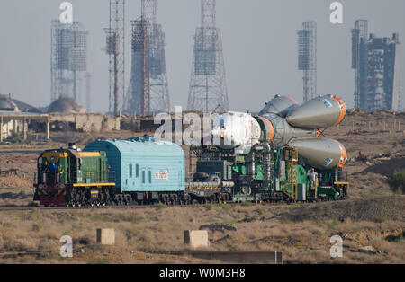 The Soyuz MS-05 spacecraft is rolled out by train to the launch pad at the Baikonur Cosmodrome, Kazakhstan, on July 26, 2017. Expedition 52 flight engineer Sergei Ryazanskiy of Roscosmos, flight engineer Randy Bresnik of NASA, and flight engineer Paolo Nespoli of ESA (European Space Agency), are scheduled to launch to the International Space Station aboard the Soyuz spacecraft from the Baikonur Cosmodrome on July 28. NASA Photo by Joel Kowsky/UPI Stock Photo