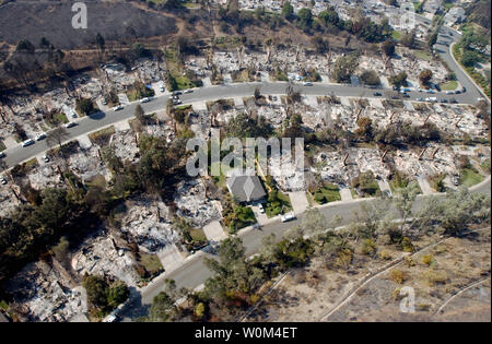 A view of the destroyed homes throughout the Scripps Ranch area of San Diego from a Sea King helicopter (UH-3H) assigned to the 'Golden Gators' of Reserve Helicopter Combat Support Squadron Eighty Five (HC-85), October 29. 2003  Wild fires have caused extensive damage throughout Southern California, scorching more than 500,000 acres or land.   (UPI/Michael Pusnik, Jr./Navy) Stock Photo