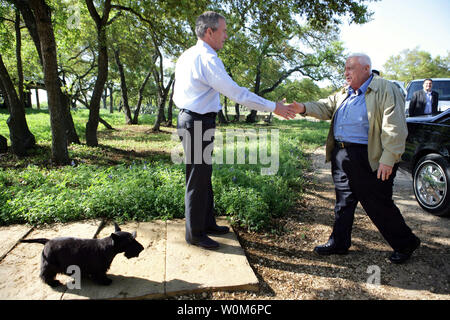 Israeli Prime Minister Ariel Sharon is greeted by US President George W. Bush upon Mr. Sharon's arrival on April 11, 2005, to the President's ranch in Crawford, Texas.    (UPI Photo/White House/Eric Draper) Stock Photo