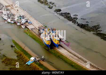 NOAA released this aerial image of boats tossed on the highway  from south Plaquemines Parish, La., near Empire, Buras and Boothville where Hurricane Katrina made landfall on Aug. 29, 2005, at approximately 7:10 a.m. EDT. NOAA was less than 10 miles off on their 12 hour prediction for landfall.    (UPI Photo/NOAA) Stock Photo