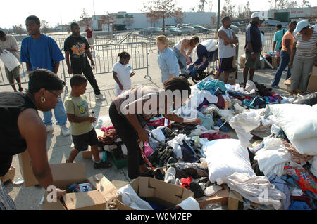 Residents of Biloxi, Miss. search through donations for items they need on September 4, 2005.  Hurricane Katrina caused extensive damage all along the Mississippi gulf coast.  (UPI Photo/Mark Wolfe/FEMA) Stock Photo