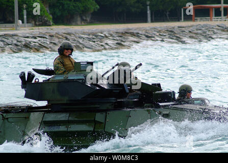 U.S. Marines in an amphibious assault vehicle from the 31st Marine Expeditionary Unit approaches the well deck of the USS Harpers Ferry, off the coast of White Beach, Okinawa, Japan on March 22, 2006. (UPI Photo/Brian P. Biller/USNV) Stock Photo