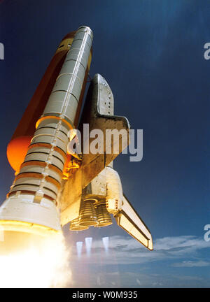 STS-121 Space Shuttle Discovery Space Shuttle Discovery blasts off from Kennedy Space Center on July 4, 2006.  After a 13-day and a five-million-mile mission that included a supply and repair visit to the International Space Station, the Shuttle Orbiter Discovery landed safely on runway 15 at Kennedy Space Center's Shuttle Landing Facility on Monday, July 17, 2006.   (UPI Photo/NASA) Stock Photo