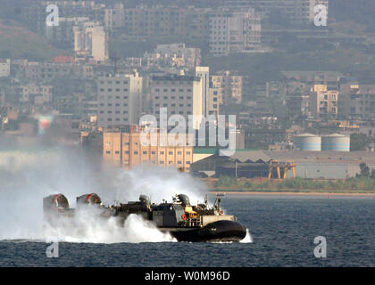 A U.S. Navy landing craft air cushion departs the shore of Lebanon after picking up evacuating American citizens on July 22, 2006. The U.S. Navy is assisting in the departure of U.S. citizens from Lebanon after fighting broke out between Israel and Hezbollah Guerillas.  (UPI Photo/Robert J. Fluegel/US Nazy)