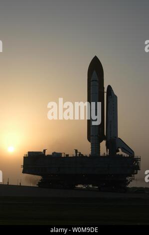 Space Shuttle Atlantis begins the slow journey to Launch Pad 39A from ...
