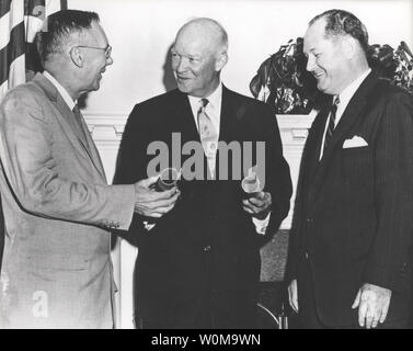NASA (National Aeronautics and Space Administration) was created on October 1, 1958, to perform civilian research related to space flight and aeronautics. President Dwight D. Eisenhower commissioned Dr. T. Keith Glennan, right, as the first administrator for NASA and Dr. Hugh L. Dryden as deputy administrator.  (UPI Photo/NASA)