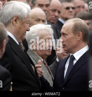 Former Russian President Boris Yeltsin, shown in this 2006 file photo, died at the age of 76 on April 23, 2007 in Moscow. Yeltsin pushed Russia to democracy and a market economy after helping in the collapse of the Soviet Union communist state in 1991. In this file photo, President Vladimir Putin (R) greets former President Boris Yeltsin during a ceremony marking the 70th anniversary of the Regiment in Moscow Kremlin on May 7, 2006.  (UPI Photo/Anatoli Zhdanov/FILES) Stock Photo