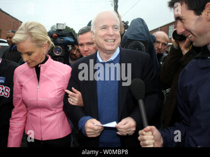 Presidential hopeful Sen. John McCain, R-Ariz, walks with his wife Cindy as they arrive at a polling place in Charleston, South Carolina on January 19, 2008 during the Republican primary. (UPI Photo/Nell Redmond) Stock Photo
