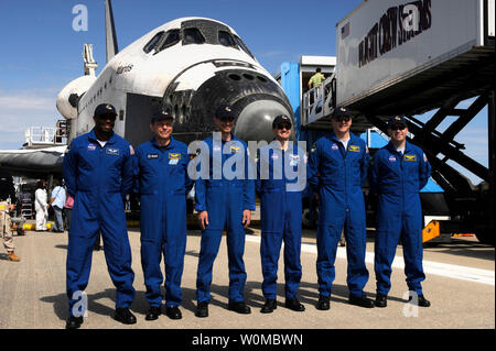The crew of the space shuttle Atlantis (STS-122) (L to R) Mission Specialist Leland Melvin, European Space Agency astronaut Hans Schlegel of Germany, Mission Specialists Stanley Love, Rex Walheim, Pilot Alan Poindexter, and Commander Steve Frick pose for a photograph in front of the space shuttle Atlantis after it landed at the Shuttle Landing Facility at 9:07 AM at Kennedy Space Center, Florida on February 20, 2008. The crew completed delivery of the European Space Agency's (ESA) Columbus laboratory to the International Space Station.  (UPI Photo/Bill Ingalls/NASA) Stock Photo