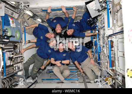 The STS-123 crew are pictured on the International Space Station on March 24, 2008. Clockwise from the lower right corner are astronauts Dominic Gorie, commander; Robert L. Behnken and Rick Linnehan, both mission specialists; Gregory H. Johnson, pilot; and Mike Foreman and JAXA's Takao Doi, both mission specialists. (UPI Photo/NASA) Stock Photo