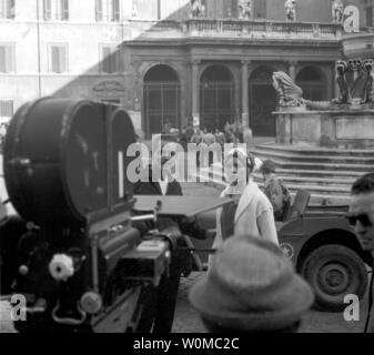 Charlton Heston died at the age of 84 at his home in Beverly Hills on April 5, 2008. He is seen in this December 10, 1961 file photo with Elsa Martinelli in Rome during the filming of 'The Pigeon that Took Rome' a war time comedy, which premiered in 1962. (UPI Photo/Files) Stock Photo