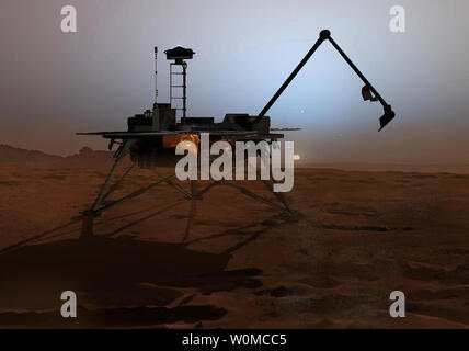 In this artist conception, the Phoenix Mars Lander, which launched in August 2007 and the first project in NASA's Mars Scout missions, landed on Mars on May 25, 2008. The mission's plan is to land in icy soils near the north polar permanent ice cap of Mars and explore the history of the water in these soils and any associated rocks, while monitoring polar climate.The spacecraft and its instruments are designed to analyze samples collected from up to a half-meter (20 inches) deep using its robotic arm. The arm extends forward in this artist's concept of the lander on Mars. (UPI Photo/NASA) Stock Photo