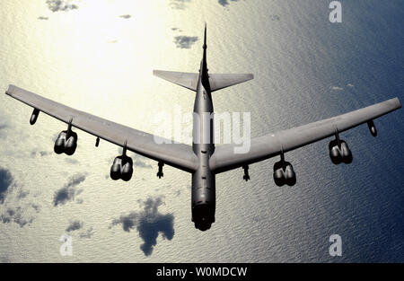 A B-52 Stratofortress aircraft, from Minot Air Force Base, North Dakota, flies over the Pacific Ocean on November 13, 2008. The aircraft is deployed to the 23rd Expeditionary Bomb Squadron at Andersen Air Force Base, Guam, and is part of a continuing operation to maintain a bomber presence in the region. (UPI Photo/Kevin J. Gruenwald/U.S. Air Force) Stock Photo