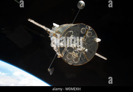 This NASA image shows the Hubble Space Telescope as it floats away from the space shuttle Atlantis after the STS-125 crew completed work on the telescope, May 19, 2009. The crew conducted five spacewalks to complete the final service mission to the telescope. (UPI Photo/NASA) Stock Photo