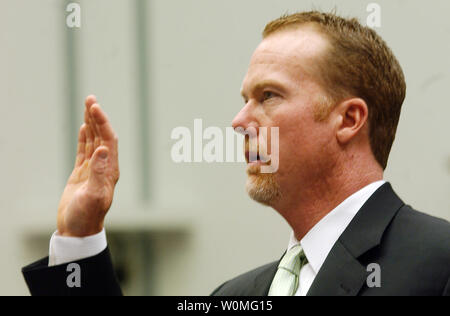 Former baseball player Mark McGwire and wife attend the 2/15/05