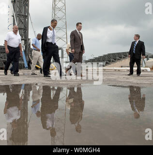 U.S. President Barack Obama (C) tours the commercial rocket processing facility of Space Exploration Technologies, known as SpaceX, along with Elon Musk, SpacdeX CEO at Cape Canaveral Air Force Station in Cape Canaveral, Florida on April 15, 2010. President Obama visited the Kennedy Space Center to deliver remarks on the new course the administration is charting to maintain U.S. leadership in human space flight. UPI/Bill Ingalls/NASA Stock Photo