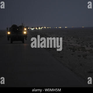 Soldiers from the 4th Stryker Brigade Combat Team, 2nd Infantry Division convoy into Kuwait in the early morning hours of August 19, 2010. The 4/2 convoyed their own vehicles out of Iraq after a year-long tour there, bringing troop levels in the country closer to the 50,000 mark. UPI/Kimberly Johnson/U.S. Army Stock Photo